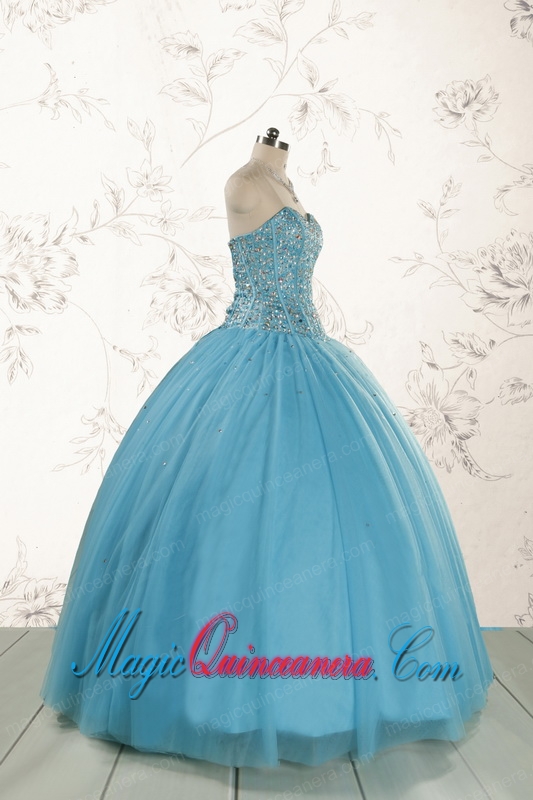 2015 Ball Gown Baby Blue Beading Quinceanera Dress with Wraps