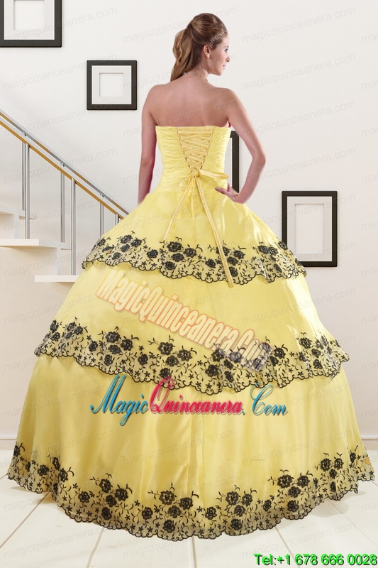 2015 Light Yellow Quinceanera Dress with Appliques and Ruffled Layers