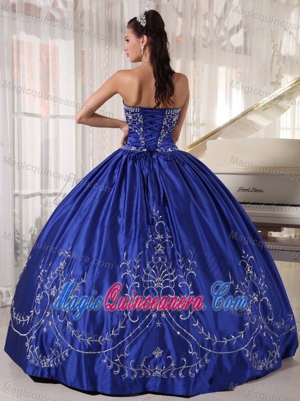 Dazzling Blue Strapless Satin Dress for a Quinceanera with Embroidery