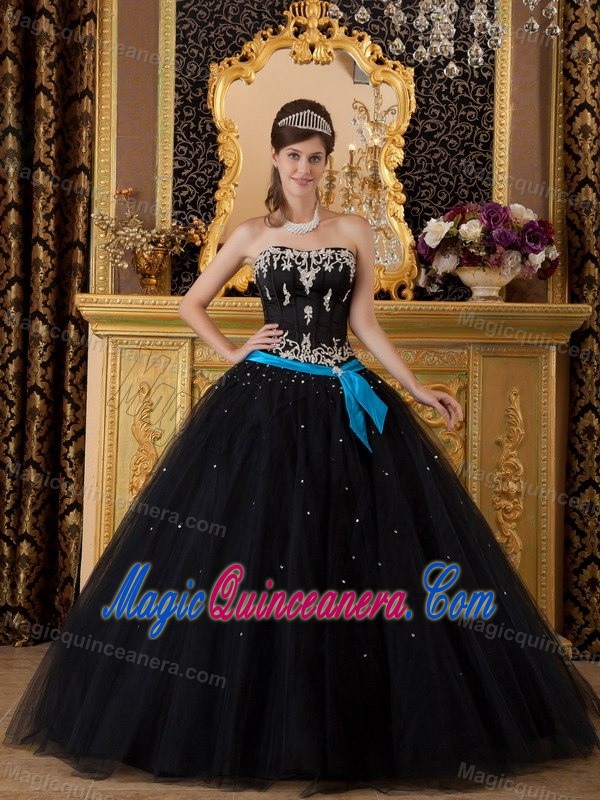 Strapless Black Sweet 16 Dress with Silver Embroidery and a Blue Sash