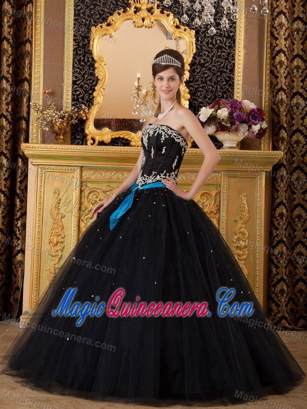Strapless Black Sweet 16 Dress with Silver Embroidery and a Blue Sash