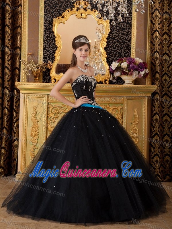 Strapless Black Sweet 16 Dress with Silver Embroidery and a Blue Sash