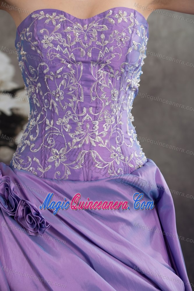 Lavender Ruffled Quinceanera Dress with Hand Made Flowers and Embroidery