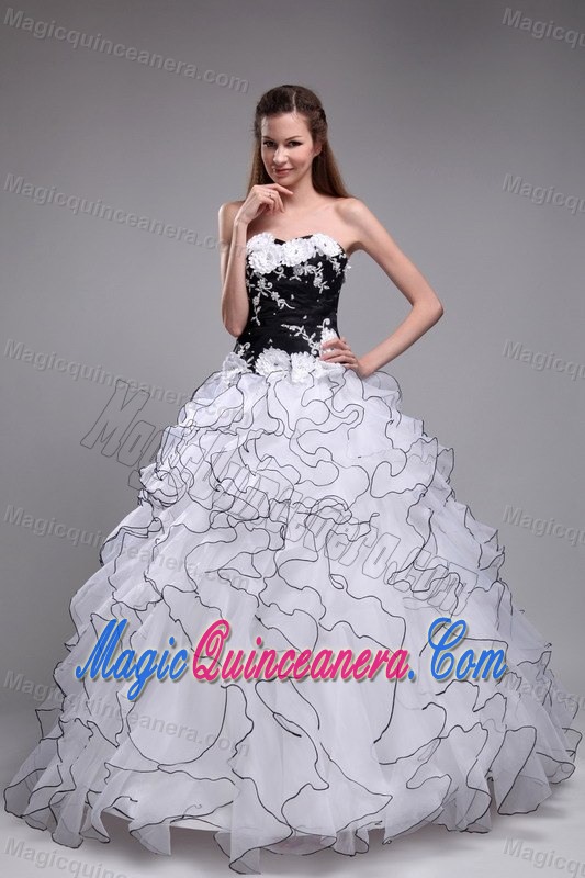 White and Black Quinceanera Dress with Ruffles and Hand Made Flowers