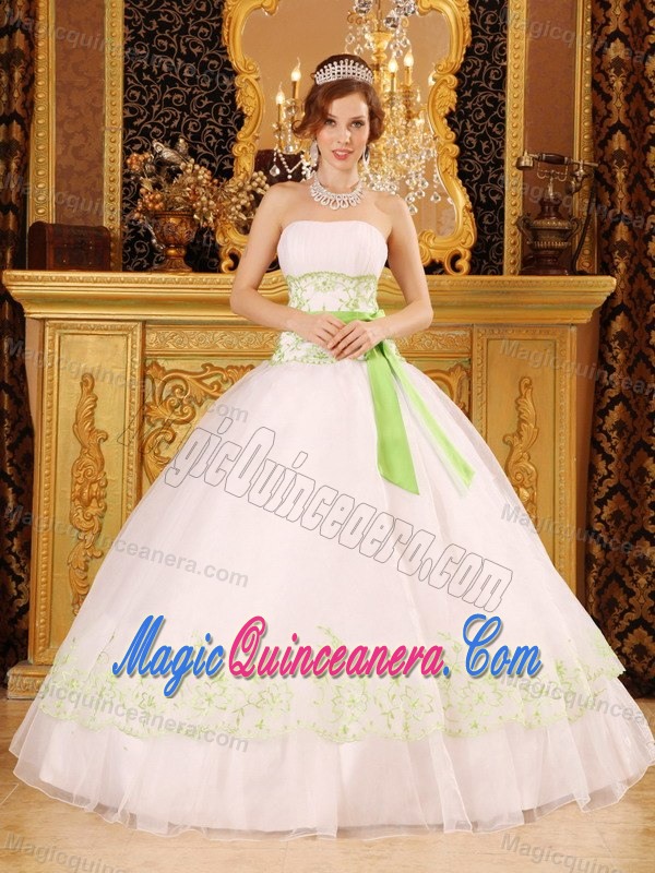 White Strapless Sweet 15 Dress with Green Embroidery and a Bowknot Sash