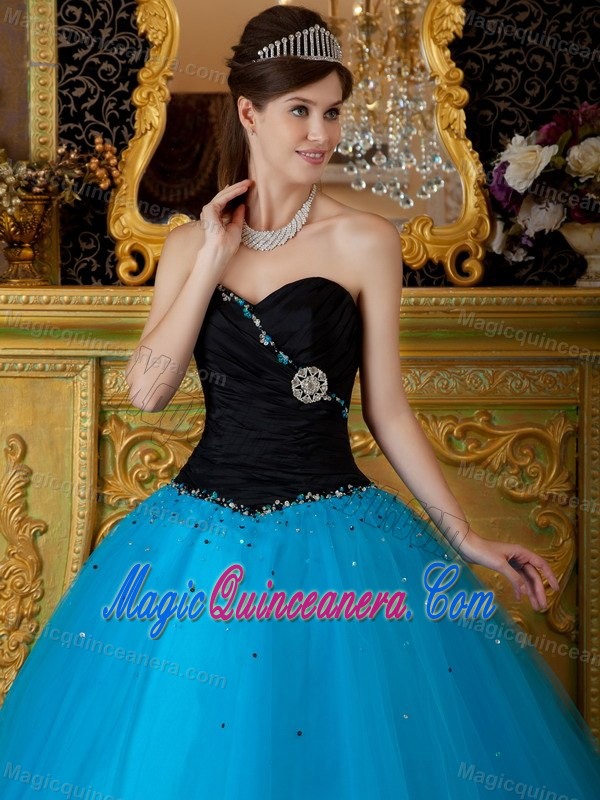 Sweetheart Quinceanera Dress with a Taffeta Black Top and a Tulle Blue Bottom