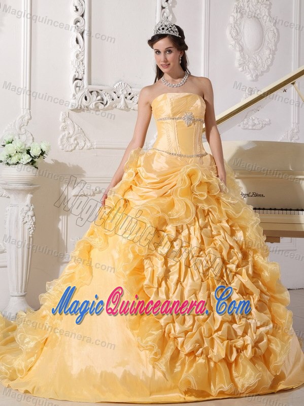 Strapless Gold Quinceanera Dress with Ruffles and a Chapel Train