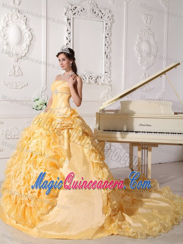 Strapless Gold Quinceanera Dress with Ruffles and a Chapel Train