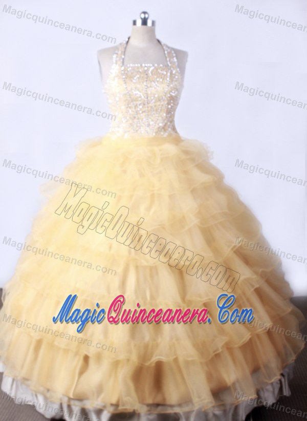 Gold Halter Little Girl Pageant Dress With Ruffled Layers and Beading