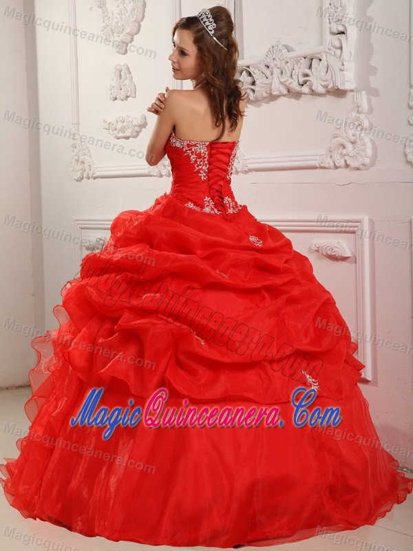 Red Quinceanera Gown Dress with Strapless Neckline and Ruffled Skirt