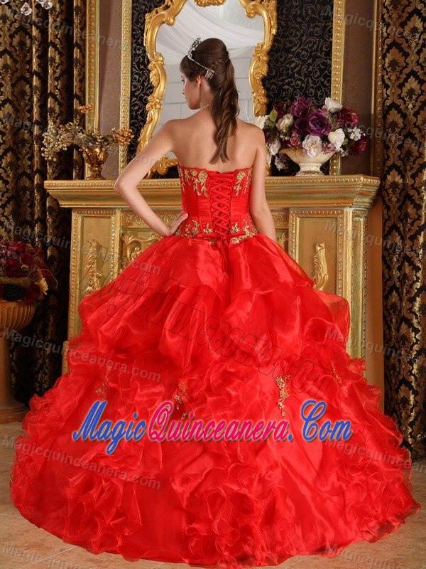 Red Strapless Quinceanera Gown with Gold Appliques by Organza