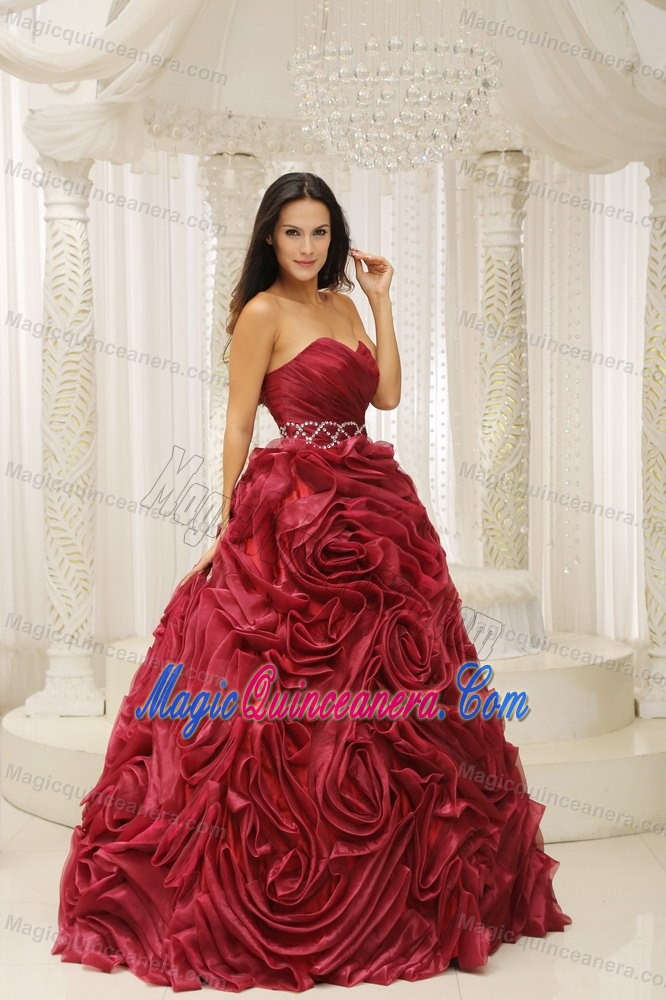 Beaded Wine Red Sweetheart Quinceanera Gown with Rolling Flowers