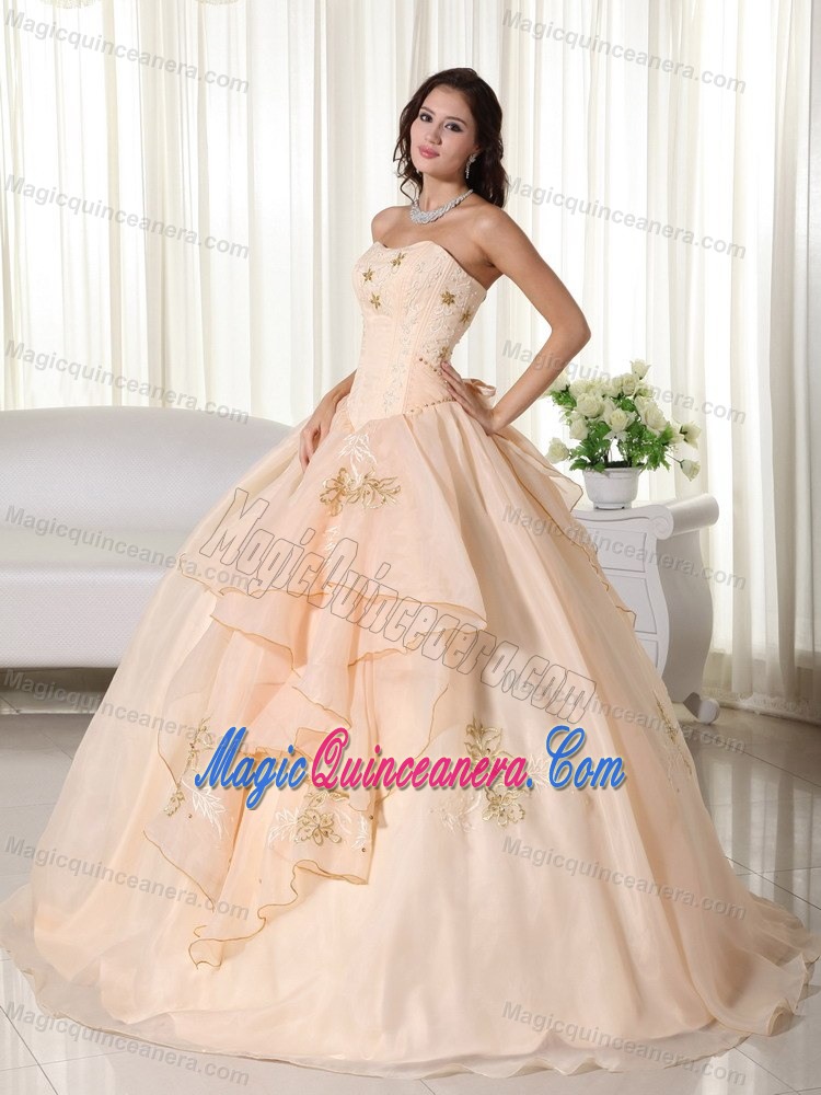 Unique Champagne Ruffled Quinceanera Dress with Embroidery