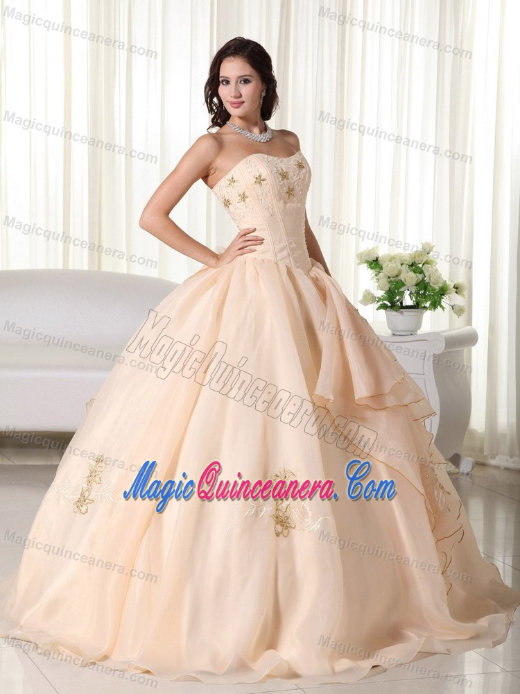 Unique Champagne Ruffled Quinceanera Dress with Embroidery