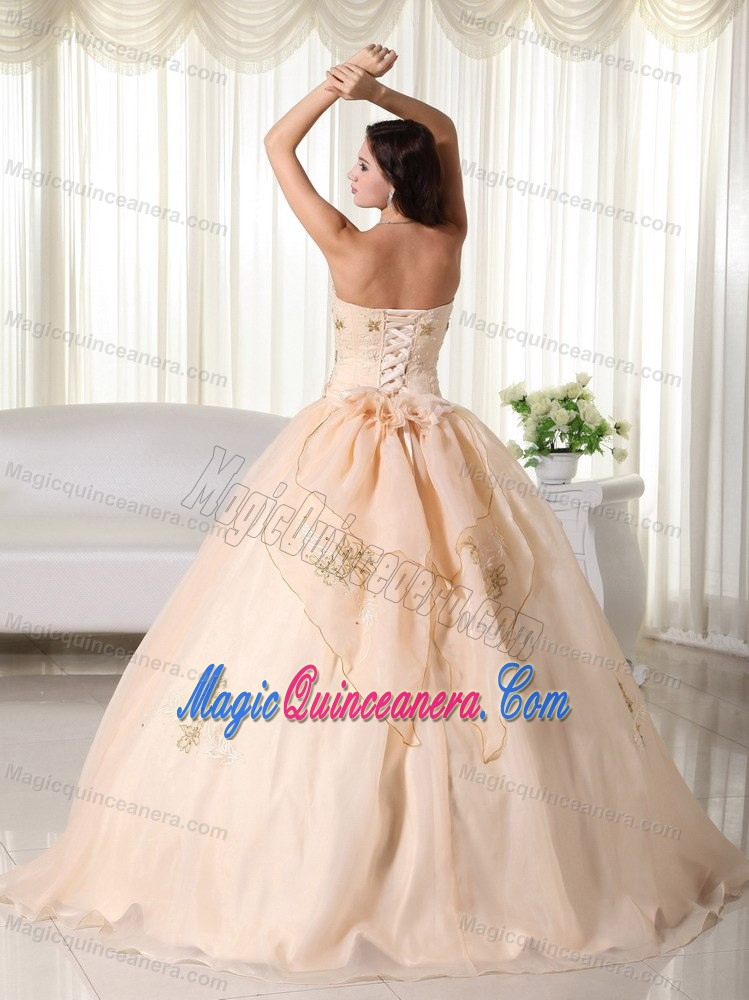 Unique Champagne Ruffled Quinceanera Dress with Embroidery