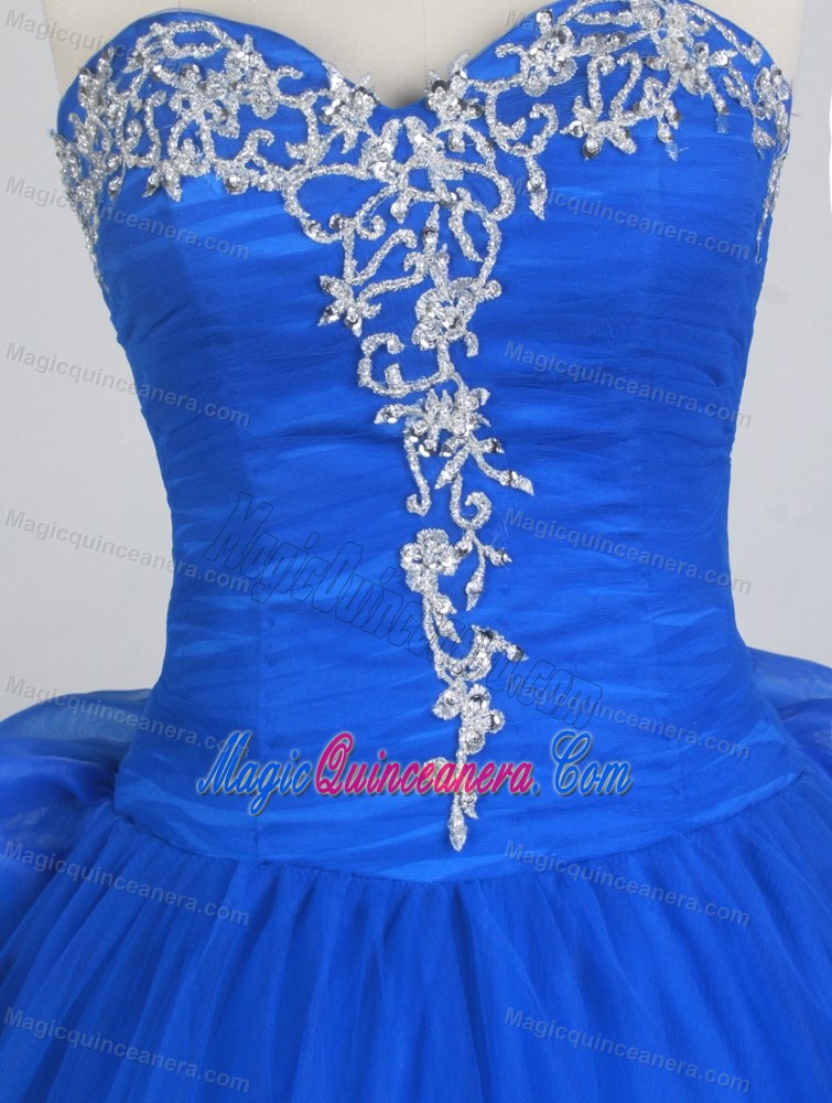 Royal Blue Quinceanera Dress with White Appliques and Ruffles Back