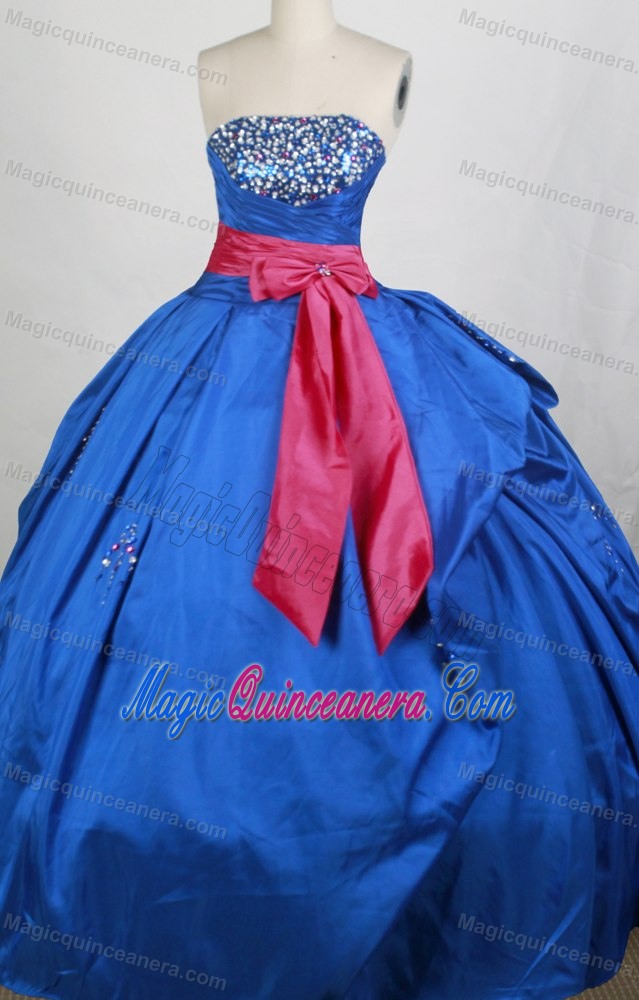 Royal Blue Quinceaneras Dress with Hot Pink Sash and Beaded Bust