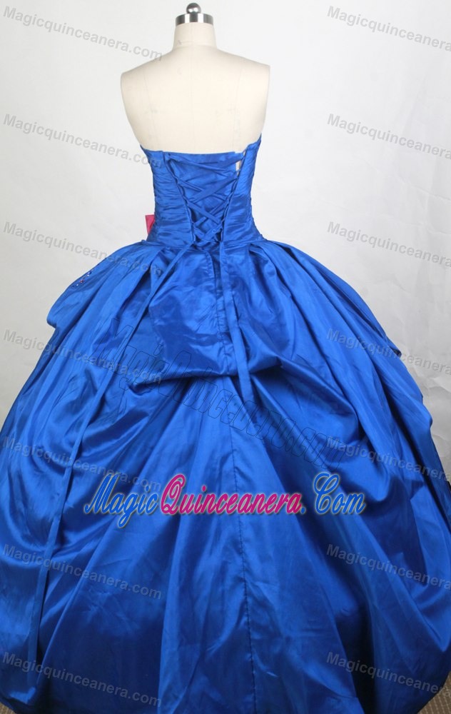 Royal Blue Quinceaneras Dress with Hot Pink Sash and Beaded Bust