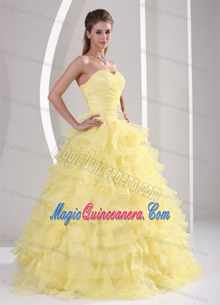 Ruched Light Yellow Sweet 15 Dresses with Beading and Ruffled Layers