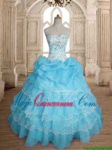 Classical Really Puffy Baby Blue Quinceanera Dress with Ruffled Layers and Beading