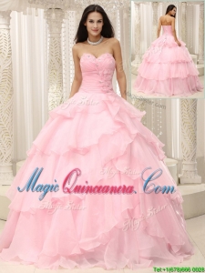 Beautiful Baby Pink Quinceanera Gowns with Beading and Ruffles