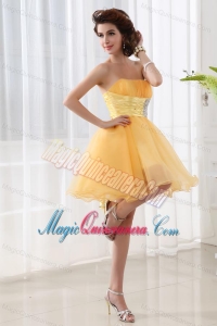 A-line Strapless Organza Gold Mini-length Dama Dress for Quinceaneras with Ruching