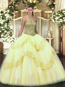 Top Selling Sweetheart Sleeveless Quinceanera Gowns Floor Length Beading and Appliques Light Yellow Tulle