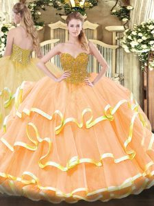 Elegant Sweetheart Sleeveless Ball Gown Prom Dress Floor Length Beading and Ruffled Layers Peach Organza