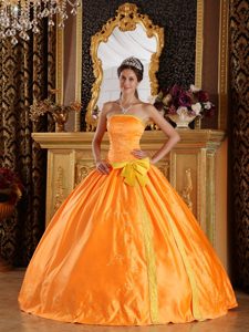 Luxury Orange Dress for Sweet 16 with Embroidery and Bowknot