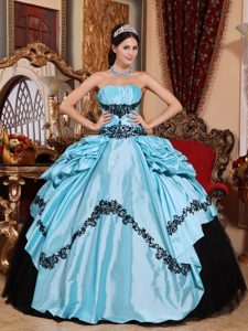 Baby Blue Quinceanera Gown with Black Appliques in Guastatoya