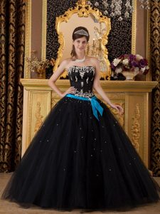 Strapless Black Sweet 16 Dress with Silver Embroidery and a Blue Sash