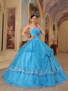 Blue Quinceanera Dress with Embroidery in Organza and Shinning Fabric