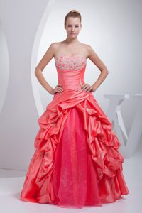 Beaded A-line Quinceanera Dress with Pick-ups and Appliques in Watermelon