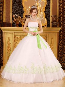 White Strapless Sweet 15 Dress with Green Embroidery and a Bowknot Sash