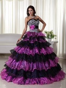 Zebra Printed Ruffled Quinceanera Dress with a Hand Made Flower Sash