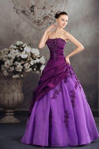 Purple Quanceanera Dress with Asymmetric Layers and Appliques