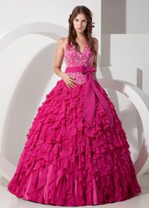 Halter-top Hot Pink Quinceanera Dress with Embroidery and a Bowknot Sash