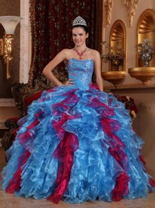 Blue and Red Sweetheart Quinceanera Dress with Beading and Ruffled Skirt