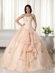 Unique Champagne Ruffled Quinceanera Dress with Embroidery