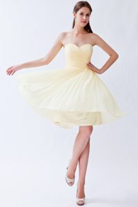 Ruched and Pleated Sweetheart Light Yellow Quinceanera Dama Dress