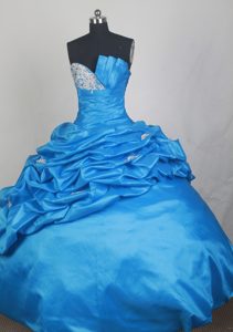 Asymmetrical Neckline for Aqua Blue Dresses for A Quinceanera 2013