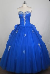 Royal Blue Quinceanera Dress with White Appliques and Ruffles Back