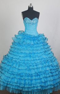Aqua Blue Dresses for A Quinceanera with Black Hemline and Layers