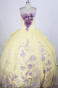 Hand Flowers Decorate Bodice Bubbled Back Yellow Quinceanera Gown