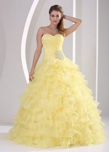 Ruched Light Yellow Sweet 15 Dresses with Beading and Ruffled Layers